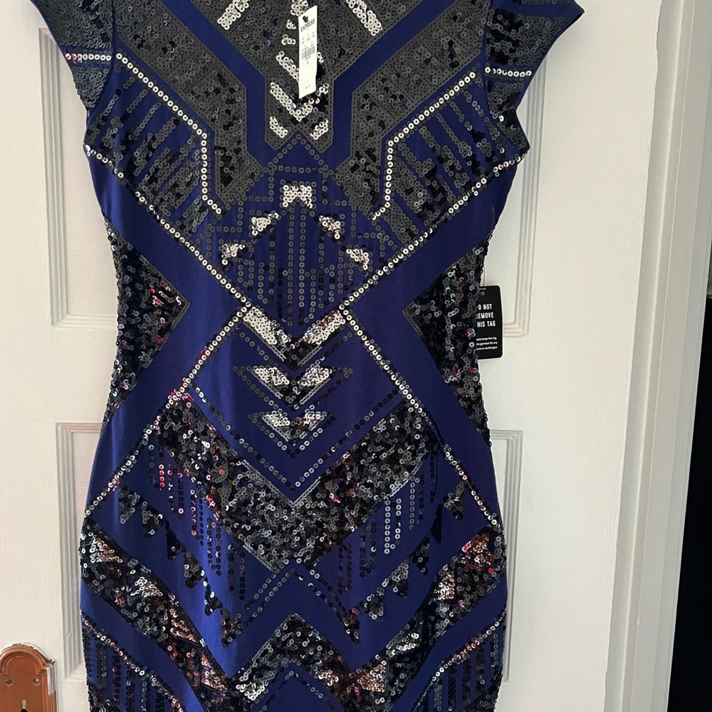 Beautiful cocktail dress, navy blue.brand new with tag. Size small , Brand new